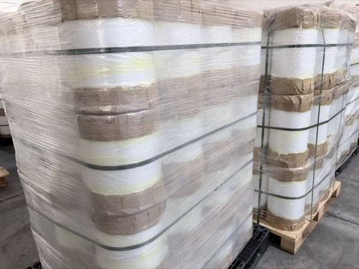 Wrapped film rolls stored on pallets