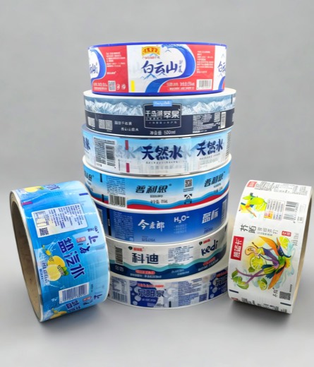Stacked printed label film rolls